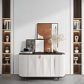 White Paneled Console Table With Abstract Art Vase And Side Cabinets With Display Shelves