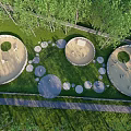 Outdoor Circular Leisure Areas With Green Grass Trees And Paths