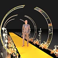 Elegant Event Entrance with Yellow Carpet Arched Decorations Lighting and Flowers