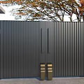 Modern Luxury Black Metal Gate With Stone Pillars And Autumn Trees