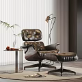 Leather Lounge Chair With Ottoman Floor Lamp Side Table And Potted Plant On Wooden Floor