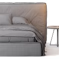 Comfortable Double Bed With Brown Upholstered Headboard White Pillows Green Blanket And Nightstand