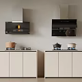 Modern Kitchen Appliances With Two Black Range Hoods Over Light Colored Cabinets And Pots