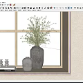 Green Plant In Ceramic Vase On Windowsill With Outdoor Scenery And Decorative Items