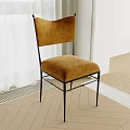 Brown Velvet Single Chair With Black Metal Frame In Modern Living Room Interior