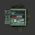 Household Electrical Distribution Box Open with Green Metal Case and Internal Safety Components