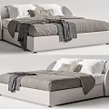 Modern Double Bed With Gray Bed Sheets White Pillows And Soft Blanket