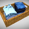 Wicker Home Organization Basket With Neatly Folded Shirts Jeans And Clothes