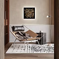 Modern Leisure Chair With Black Leather Cushion Wooden Frame On Patterned Rug Near Wall Art