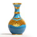 Blue Ceramic Vase With Golden Wing Motifs And Intricate Decorative Patterns