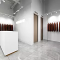 Elegant Modern Women's Clothing Store Interior With Mannequins Garment Racks And Display Tables