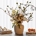 White Ceramic Vase With Mixed Flowers Decorative Branches And Oranges Near Books On Table