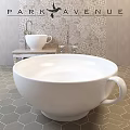 White Ceramic Bathtub With Cup Handle On Hexagonal Floor Tiles And Patterned Tiled Wall