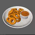 Orange Fried Rings Served on White Marble Plate with Dipping Sauce
