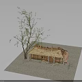 Small Tree With Green Leaves Next To Thatched Roof Cottage Model On Gray Gravel Ground