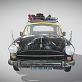 Vintage Black And Yellow Car With Roof Rack Carrying Luggage