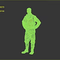 Man In Yellow Jacket Green Pants And Brown Boots Standing With Hands On Hips