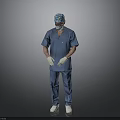 Male Medical Professional In Blue Surgical Scrubs With Cap Mask And Gloves