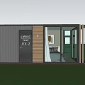 Cozy Container Leisure Area With Black Exterior Wooden Panels Grass And White Flowers
