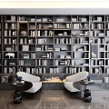Floor To Ceiling Bookshelf Filled With Books And Cozy Seats In Modern Home Library