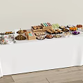 Assorted Desserts And Treats On White Tablecloth Buffet Display Table