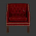 Red Tufted Armchair With Gold Nailhead Trim And Upholstered Design