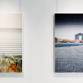 Modern Fine Arts Exhibition Hall With White Walls Large Windows And Hanging Paintings