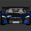 Blue McLaren Racing Car With Renault Logo Aerodynamic Rear Wing And Number 12