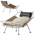 Modern Lounge Chair with Metal Frame Brown Woven Seat Black Pillow and White Fur Cushion