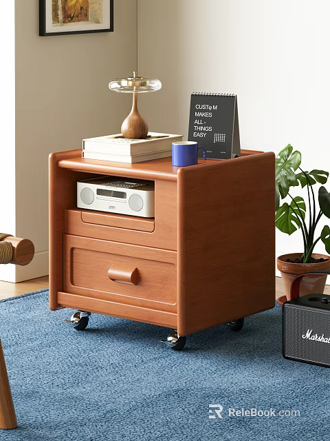 Wooden Storage Cabinet With Drawers On Wheels Topped With Radio Books Cup And Plant 3d model 