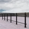 Public Facility Black Metal Railing With Brick Paved Ground And Gray Wall