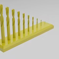 Industrial Equipment Yellow Drill Bits Set With Various Sizes Organized On Stand