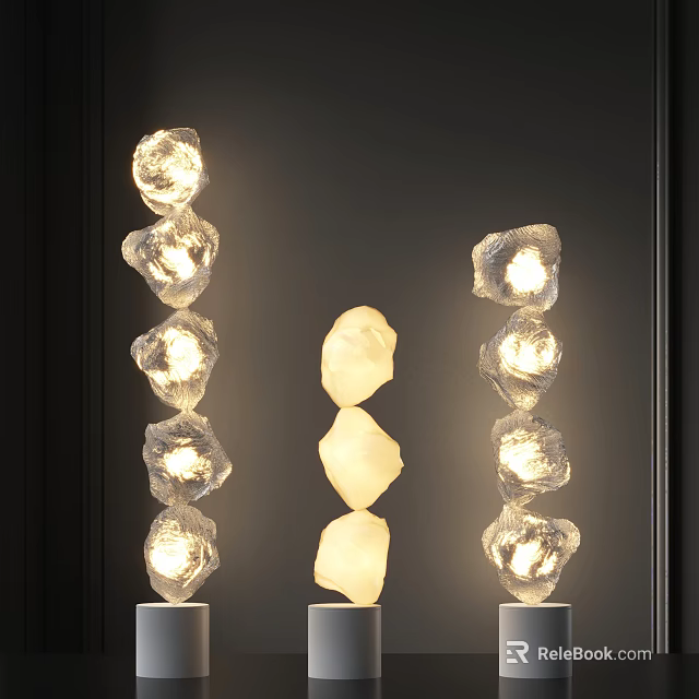 Three Modern Stacked Stone Like Floor Lamps Illuminated On Dark Background 3d model 