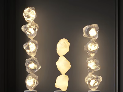 Three Modern Stacked Stone Like Floor Lamps Illuminated On Dark Background 3d model