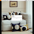 Stylish Throw Pillows With Blue Gold Circular Patterns On Soft Comfortable Sofa