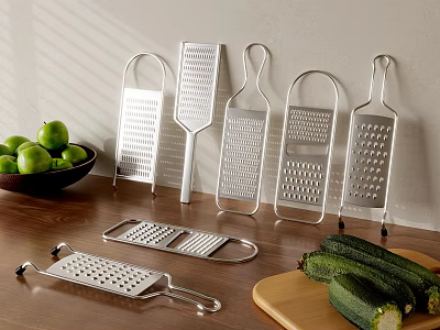 Stainless Steel Kitchen Graters on Wooden Table with Green Apples Zucchini and Cutting Board 3d model