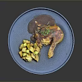 Roasted Chicken Leg with Golden Potato Chunks on Blue Plate with Herb Garnish