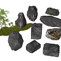 Decorative Rockery Stones In Various Shapes With Green Moss And Small Plants