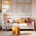 Cozy Two Seater Sofa With Colorful Cushions Throw Blanket Wooden Side Table And Woven Pendant Light