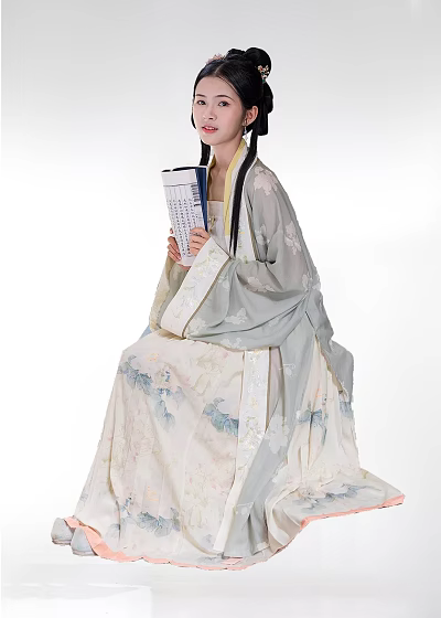 Woman in Traditional Chinese Hanfu Sitting and Holding a Book With Floral Patterns 3d model