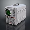 Gray Oscilloscope With Green Waveform Screen Control Knobs And Handle