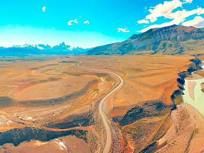 Scenic Wilderness View With Winding Road Distant Mountains Blue Sky White Clouds And Meandering River 3d model
