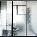 Modern Glass Room Divider With Black Frame And Textured Panels For Interior Space