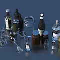 Different Types Of Alcohol Bottles And Drinking Glasses Arranged On Dark Surface
