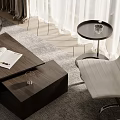 Wooden Coffee Table With Open Book And Glass Cup Near White Chair On Rug