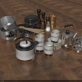 Vintage Metal Household Items Including Scale Candle Holders And Canisters On Wooden Floor