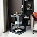 Sleek Modern Black Side Table With Coffee Cup Books Flower Vase And Sofa