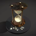 Decorative Hourglass Ornament Set with Gold Frame Black Base and Small Decorative Pieces on Base