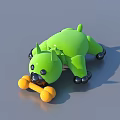 Green Stuffed Dog Toy Lying on Ground Holding Yellow Bone with Black Paws