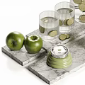 Refreshing Homemade Cucumber Water With Fresh Apples Glass Cups And Marble Tray